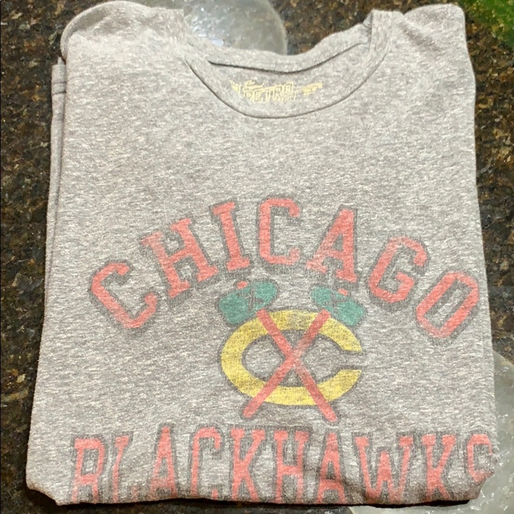 Original retro brand tee shirt.